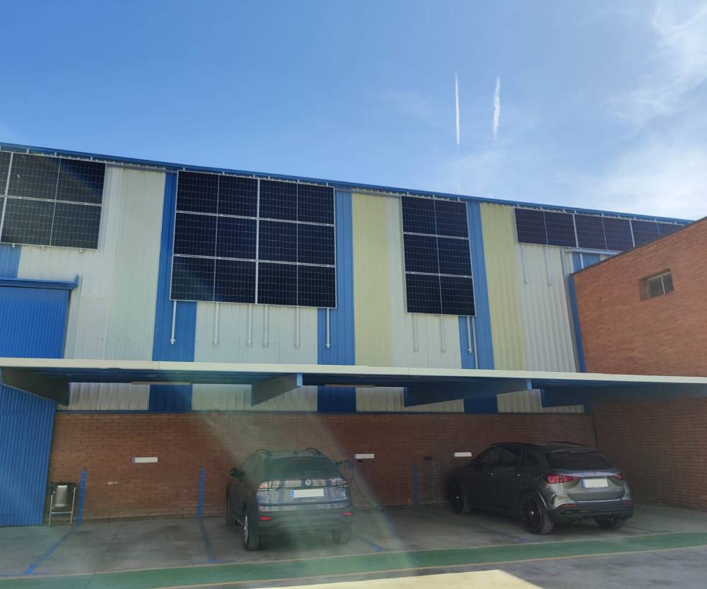 Punts de càrrega o estacions de recàrrega a pàrquing d'empresa<a href=